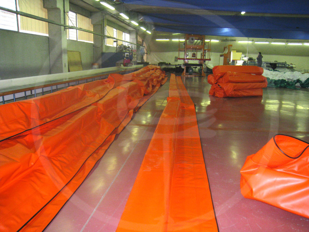 Rigid panel anti-pollution barriers working